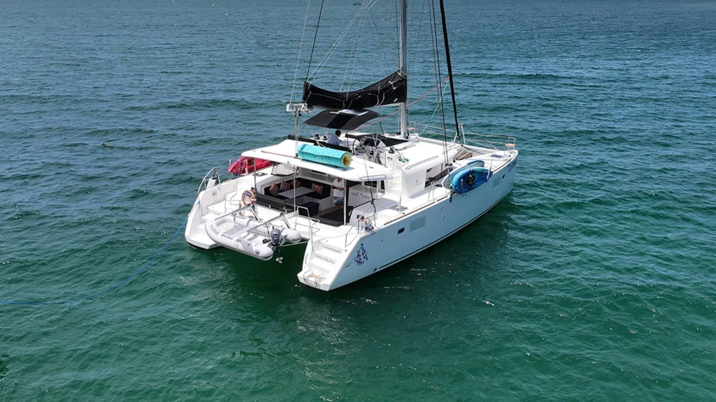 Aerial view of the 45-foot Lagoon sailing catamaran Catatonic anchored in the waters of Puerto Vallarta.