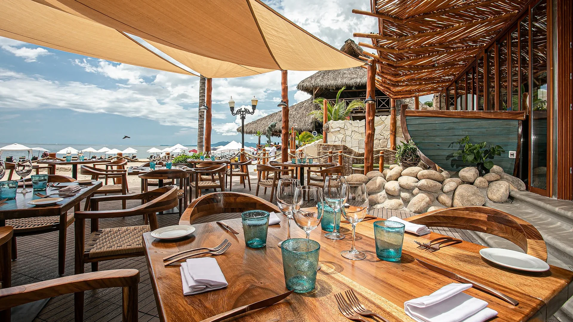 Beachfront patio at Daiquiri Dick’s restaurant overlooking Playa Los Muertos in Puerto Vallarta