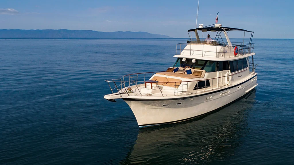 Florero 58-foot Hatteras motor yacht cruising on Banderas Bay near Puerto Vallarta