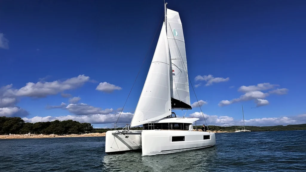 The 40-foot Lagoon sailing catamaran Ibiza sailing under full sail in Banderas Bay near Puerto Vallarta.