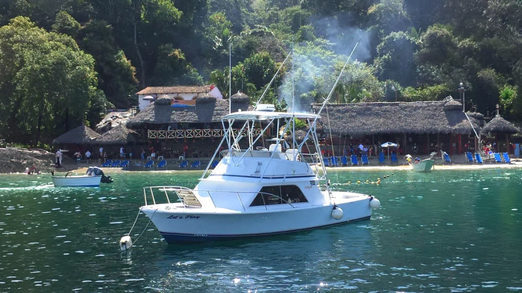 Let’s Play 32-foot Blackfin flybridge fishing boat on the water in Puerto Vallarta